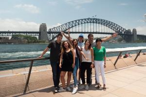 students in front of the bridge in sydney