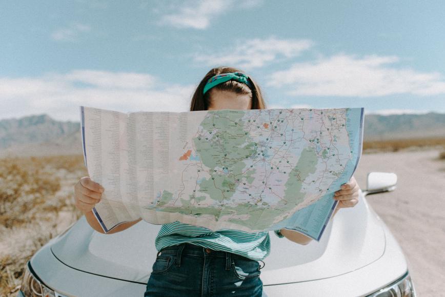 Traveller on a gap year reading a map