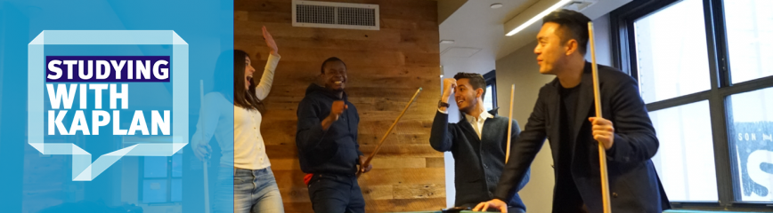 students playing pool at a residence