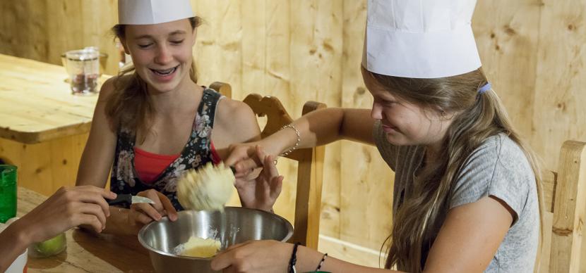 students baking a cake