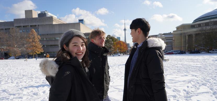 students in a parc full of snow