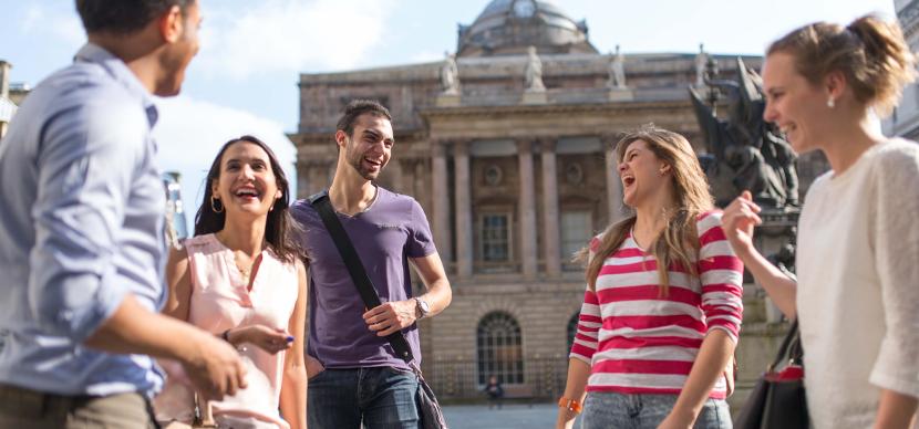 students laughing together in Liverpool