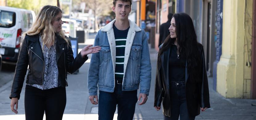 students talking together in the street