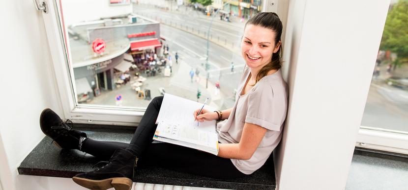 Student working near a window