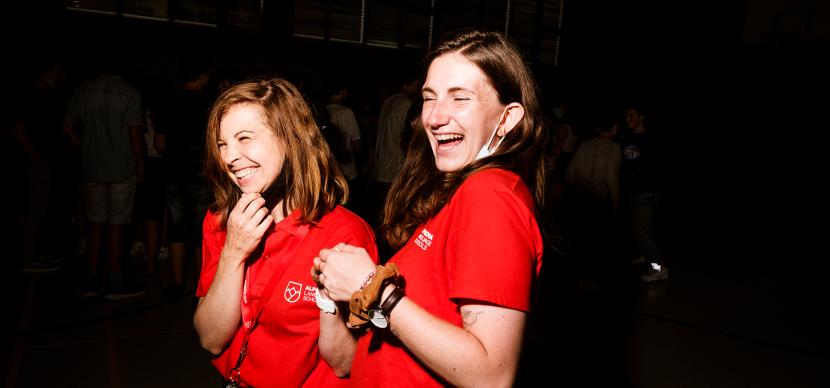 two girls having a laugh together