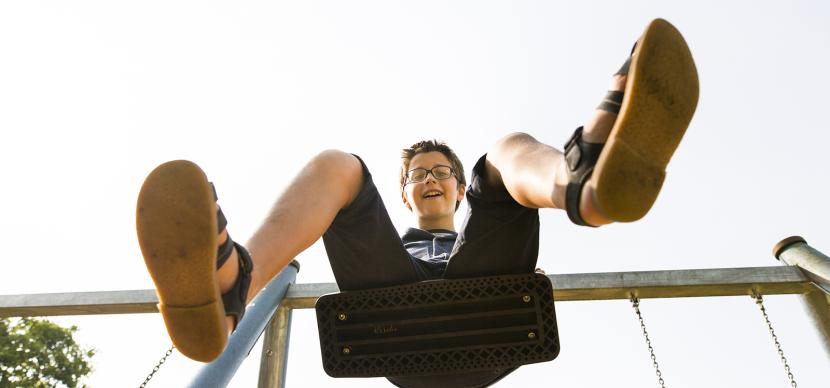 student on a swing