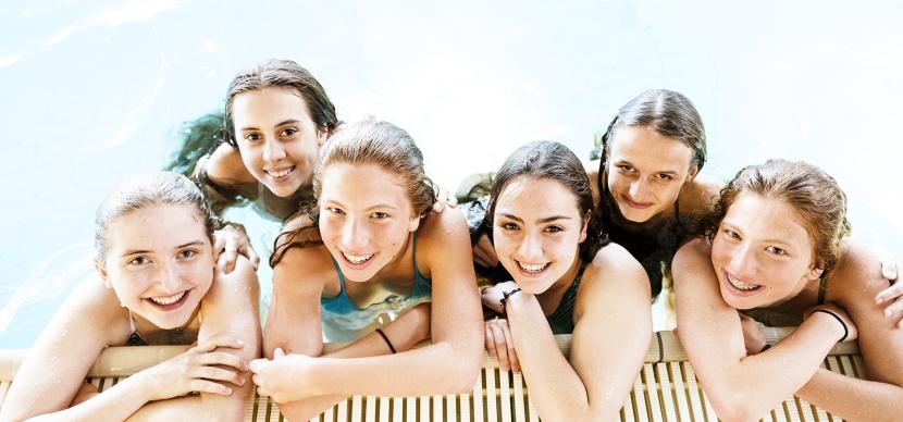 girsl in swimming pool in leysin