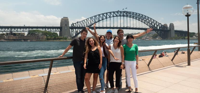 students in front of the bridge in sydney