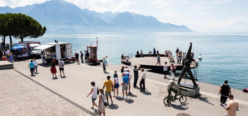 people walking near Geneva Lake in Montreux