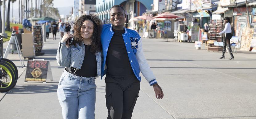 two students walking on Venice Beach