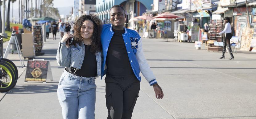 two students walking on Venice Beach