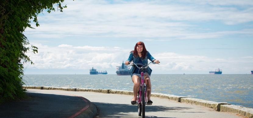 girl biking around Vancouver