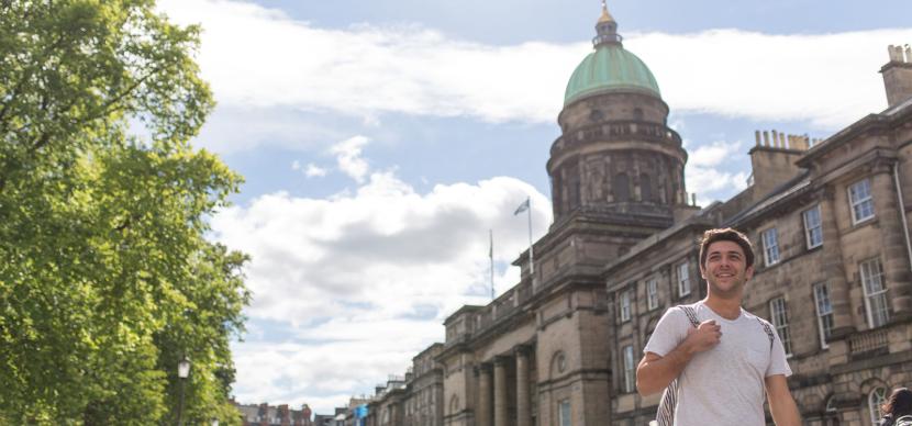 student walking in edinburgh streets