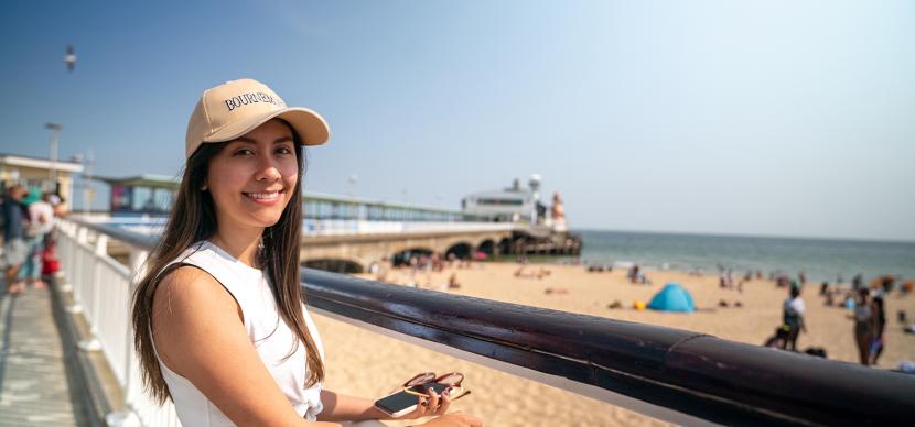 girl in front of a beach in bournemouth