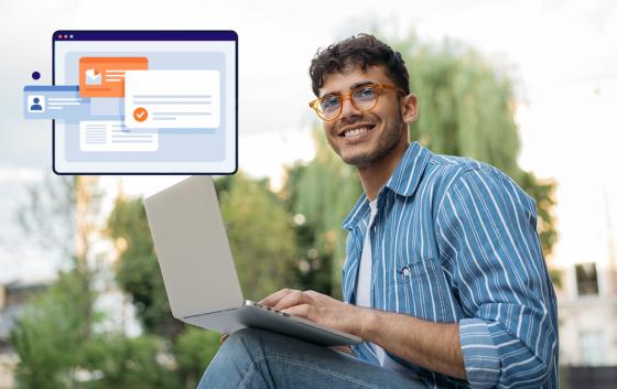 student on his laptop outside
