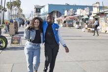 two students walking on Venice Beach