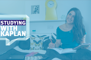 student studying in her bedroom at a residence