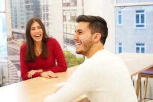 two students laughing together