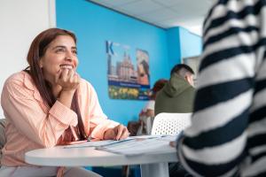 two persons talking in a kaplan class