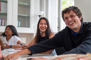 students laughing together in a classroom