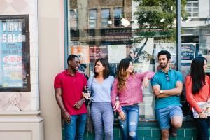 students talking together in the street