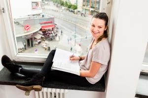 Student working near a window