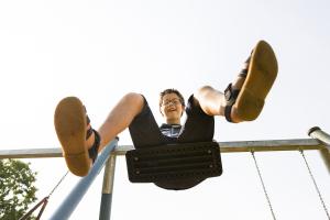 student on a swing