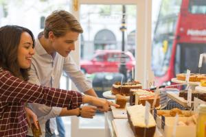 student choosing meals at a restaurant in london