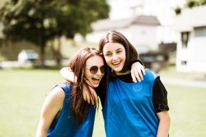 two girls hugging