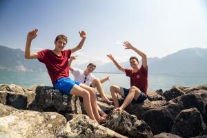 students next to the lake