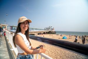 girl in front of a beach in bournemouth