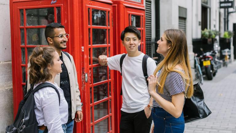 kaplan-english-school-london-students-by-phone-booth