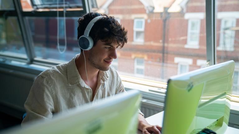 student working on a computer