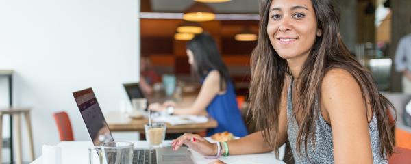 student working in a coffee shop