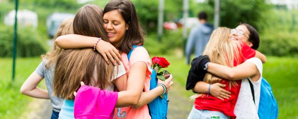 students saying bye bye to each other