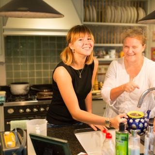 girl cooking with a host