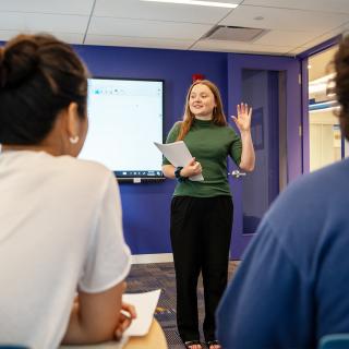 students listening to teacher