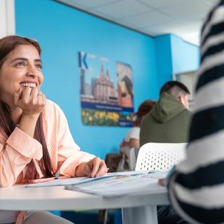 two persons talking in a kaplan class