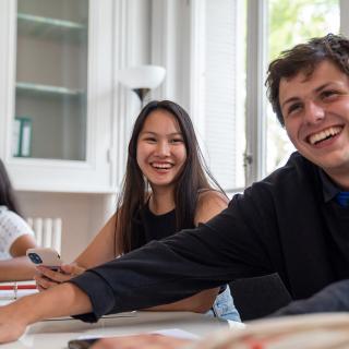 students laughing together in a classroom