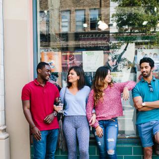 students talking together in the street