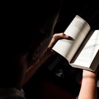 student reading books