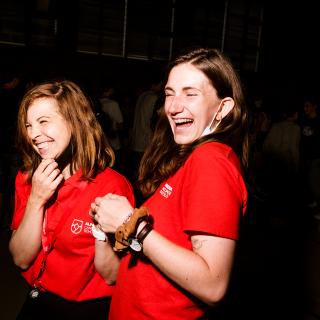 two girls having a laugh together