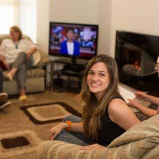 student in her host family living-room