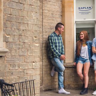 students talking outside the school