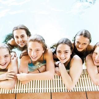 girsl in swimming pool in leysin