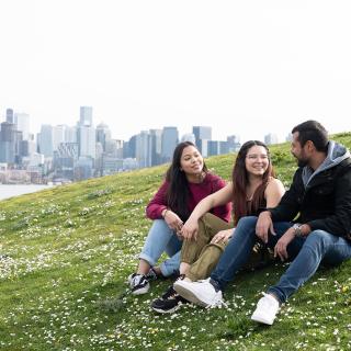 3 students on grass at seattle