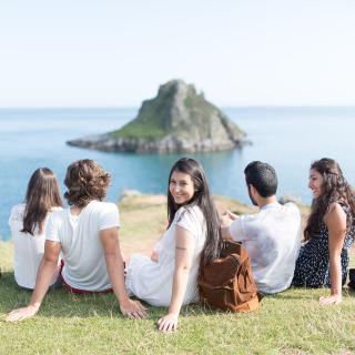 students in torquay looking at the sea