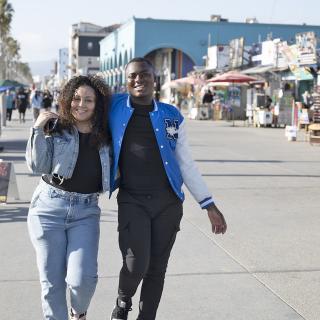 two students walking on Venice Beach