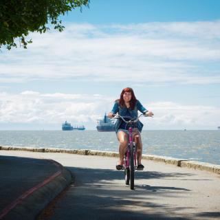 girl biking around Vancouver