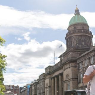 student walking in edinburgh streets